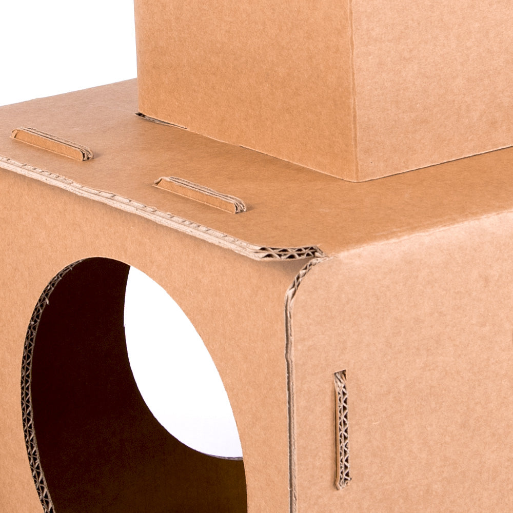 Cardboard Cat House TOM in beige color, featuring a reversible design for cats to play and explore, made from eco-friendly kraft corrugated cardboard.