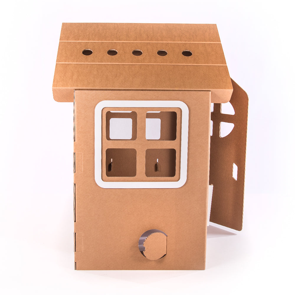 A colorful cardboard playhouse named WONDERLAND, featuring doors, windows, and a mouse door, designed for children's imaginative play.