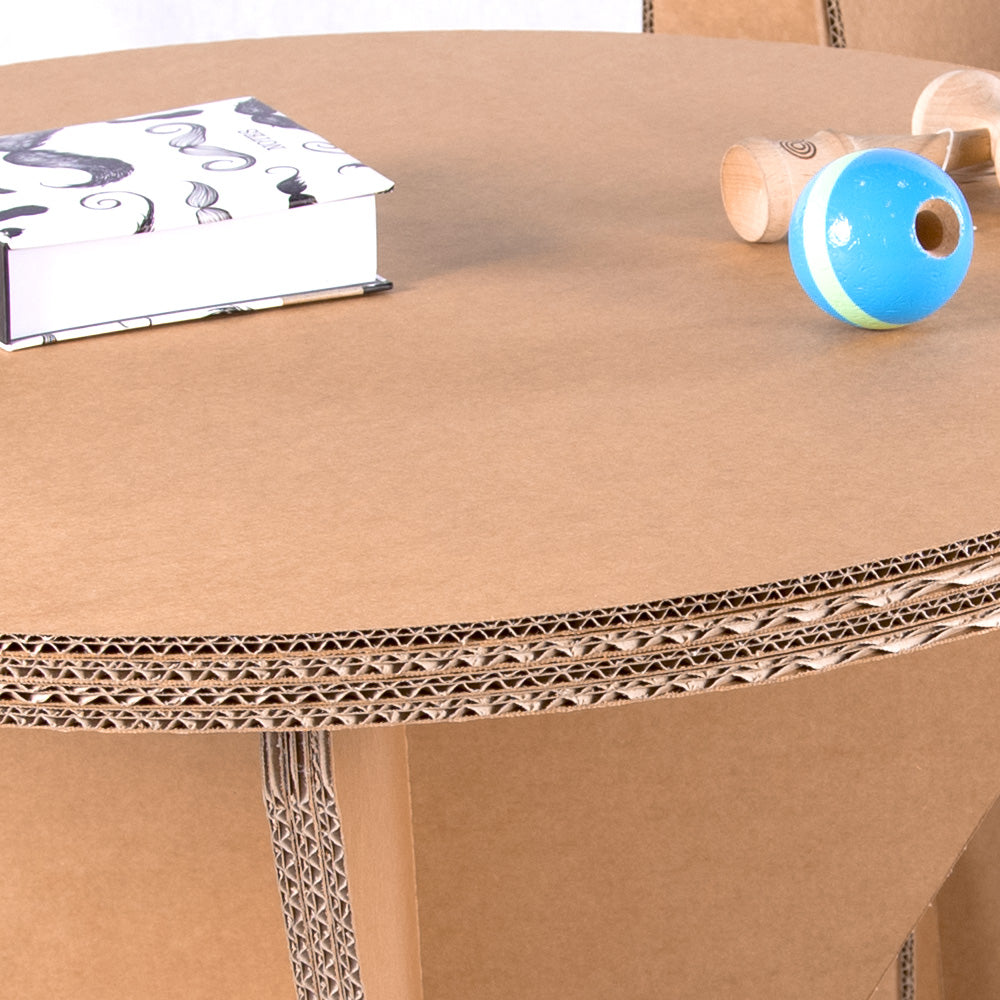 Cardboard Round Table DONNA - Natur, lightweight and demountable, made from kraft corrugated cardboard in natural beige color.