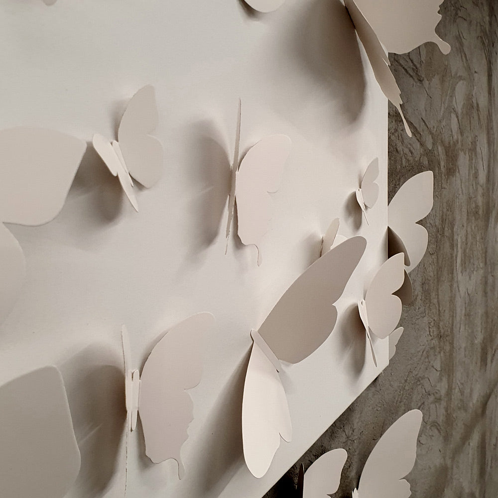 A colorful assortment of 18 cardboard 3D decorative butterflies in various sizes, perfect for wall decoration.