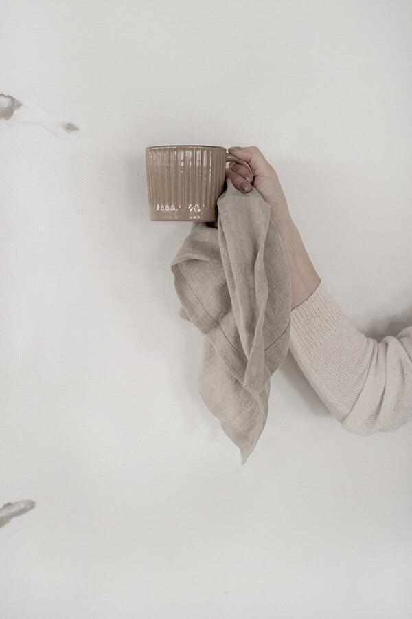 CARLA linen napkins in elegant design, showcasing beautiful corner details and Xeraliving logo.