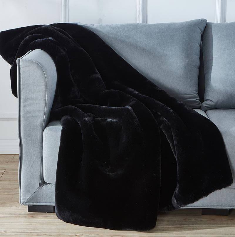 Cassilda Luxury Black Chinchilla Faux Fur Throw Blanket showcasing its plush texture and elegant design, perfect for home decor.