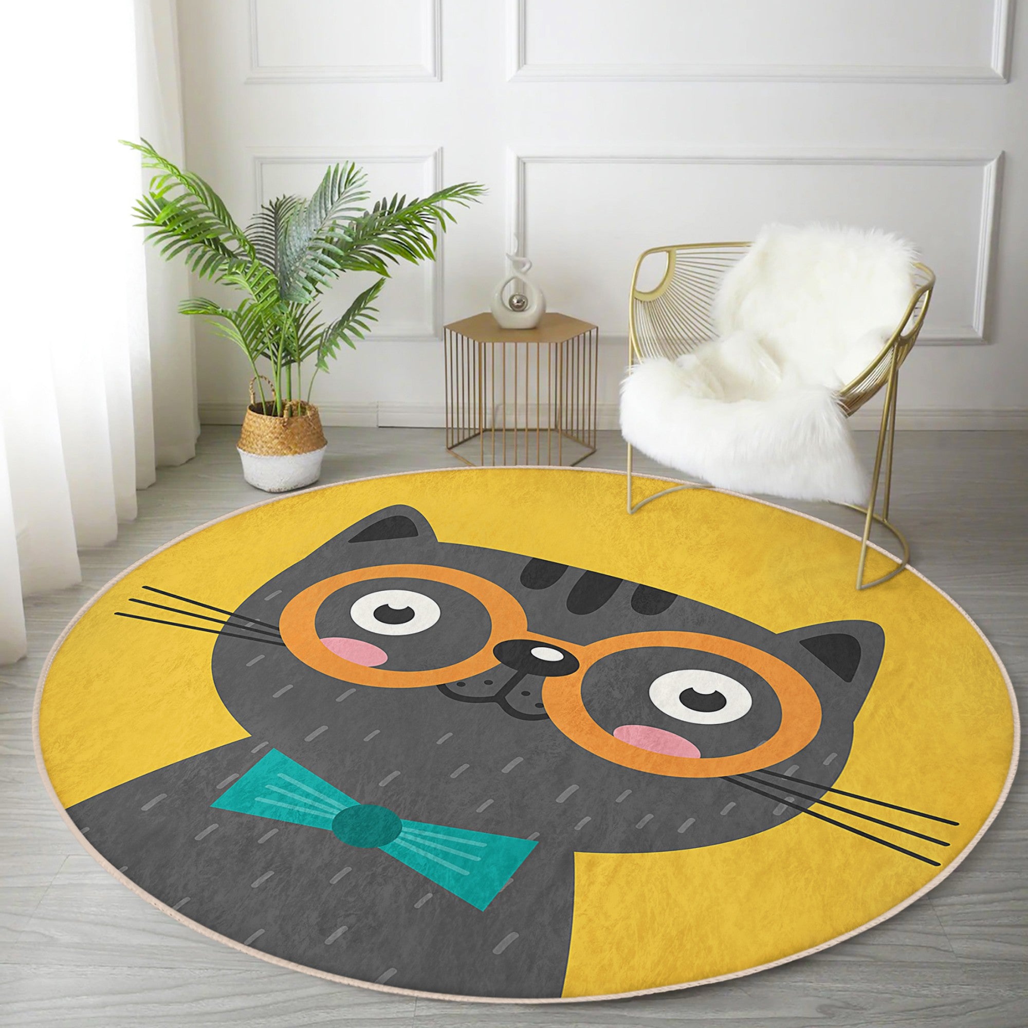 A vibrant yellow round rug featuring a whimsical cat print, perfect for adding charm to any room decor.