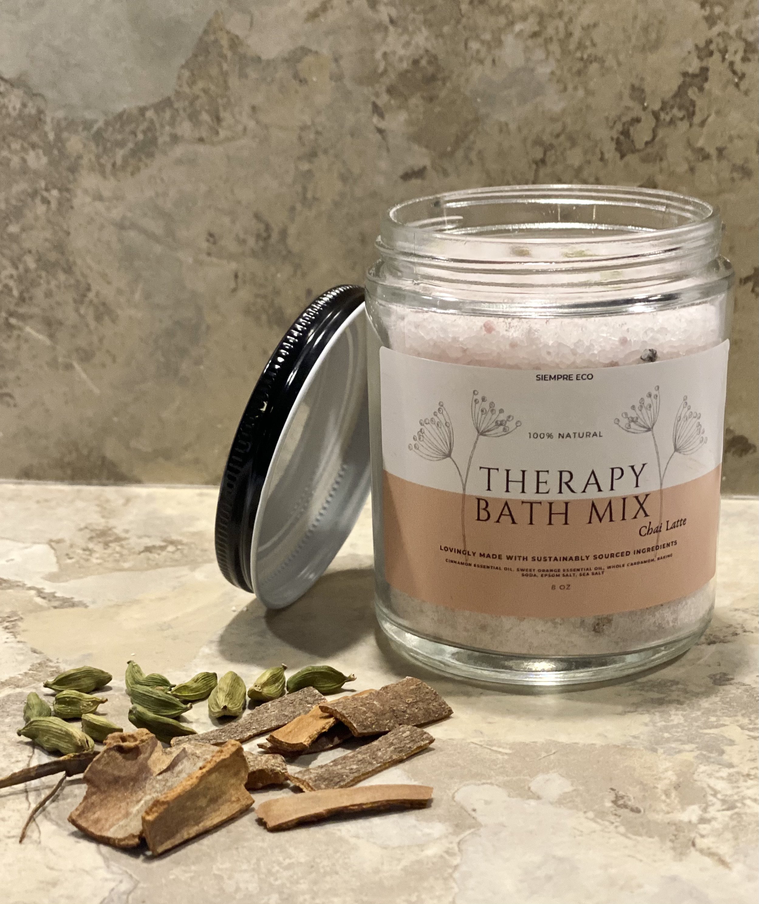 Chai Latte Therapy Bath Mix in a reusable jar with muslin pouch, featuring aromatic spices like cinnamon, cardamom, and cloves.