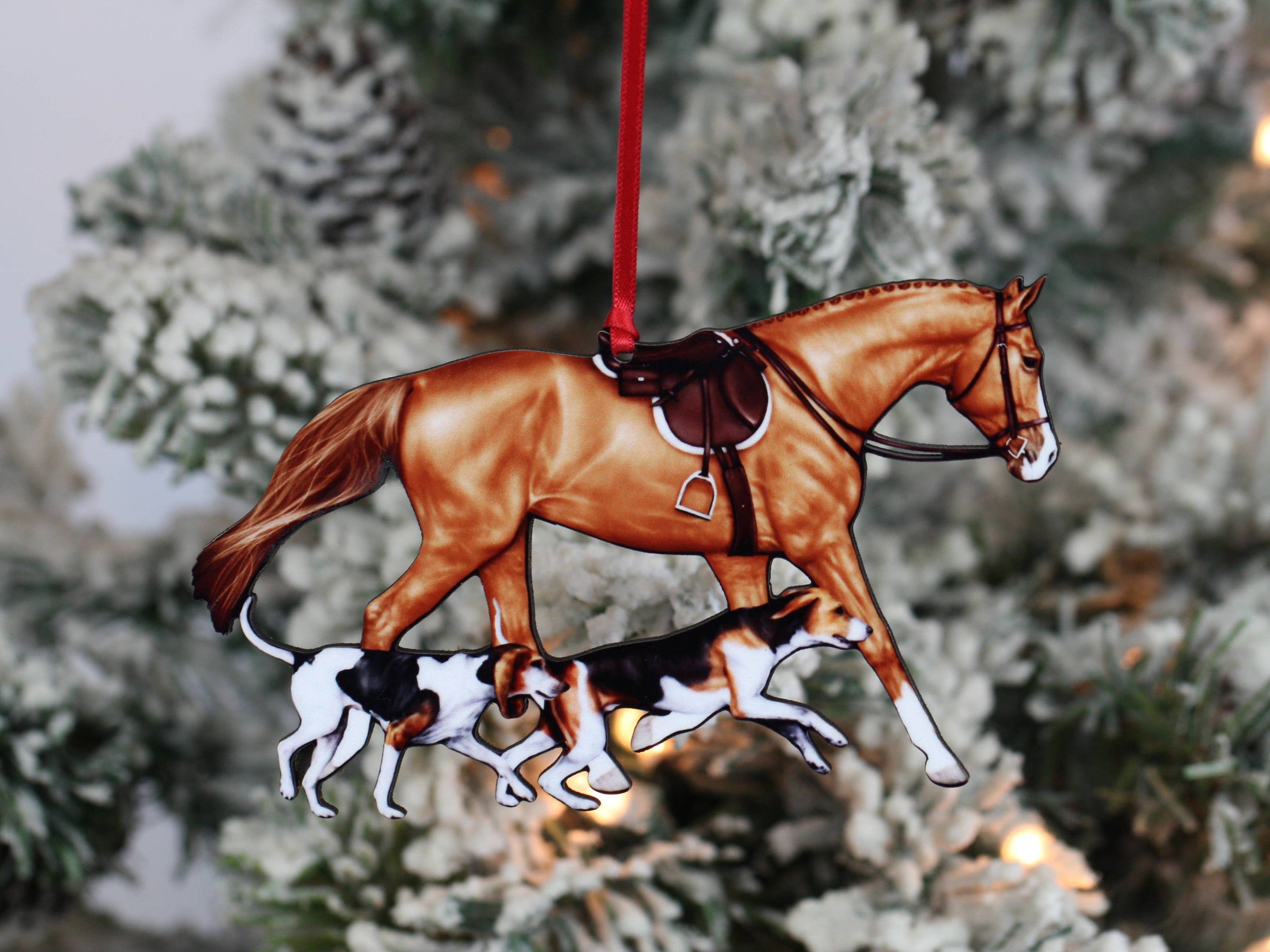 Chestnut Fox Hunter Horse and Hounds Ornament, handmade from composite wood, featuring a chestnut horse and two hounds, with red and black ribbons.
