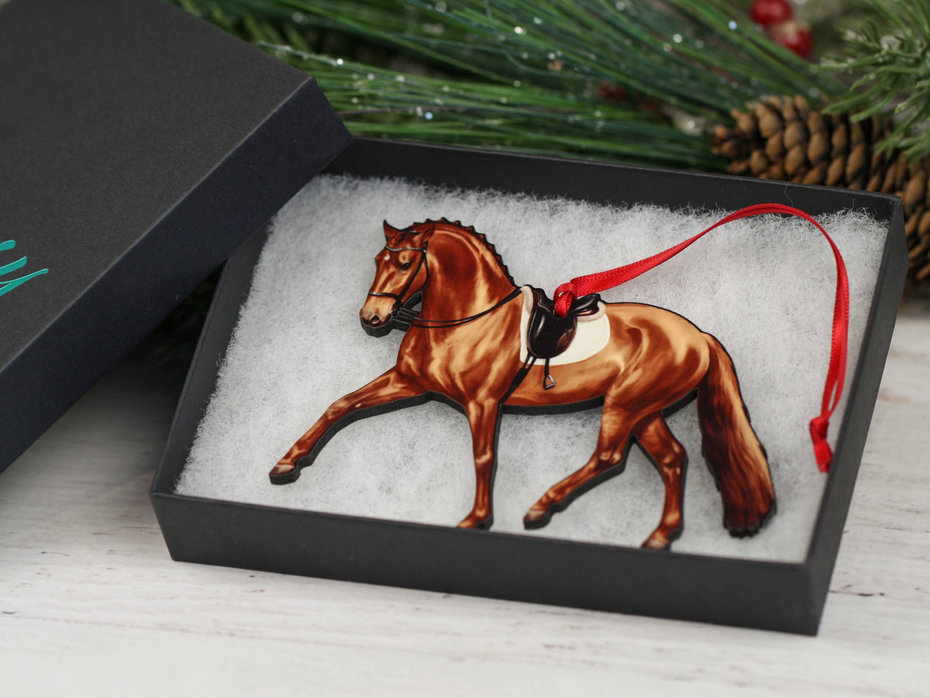 Chestnut Half Pass Dressage II Ornament showcasing a dressage horse in motion, handmade from composite wood with a glossy finish.