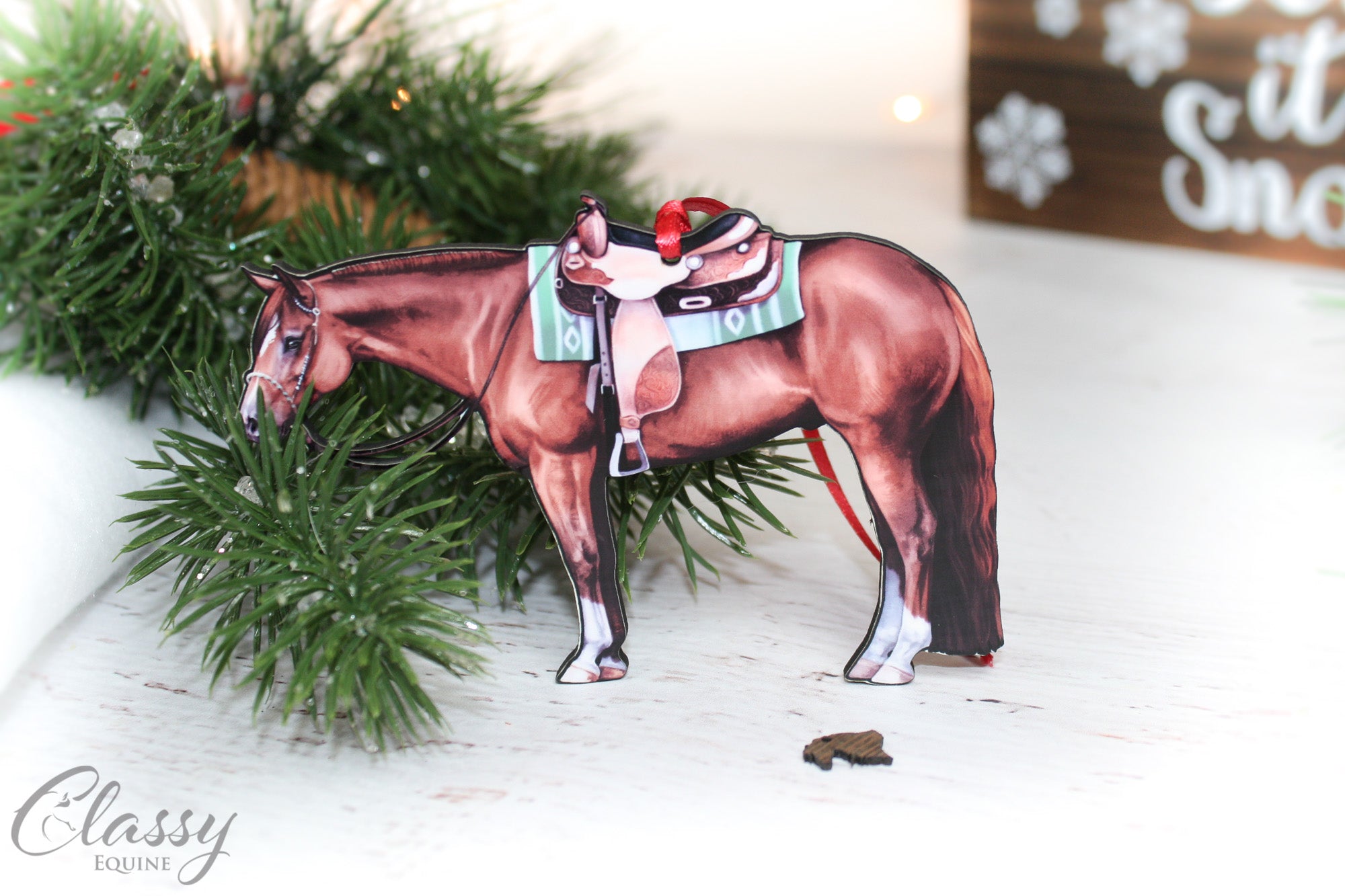 A beautifully crafted chestnut western Quarter Horse ornament made from composite wood, featuring intricate laser-cut details.