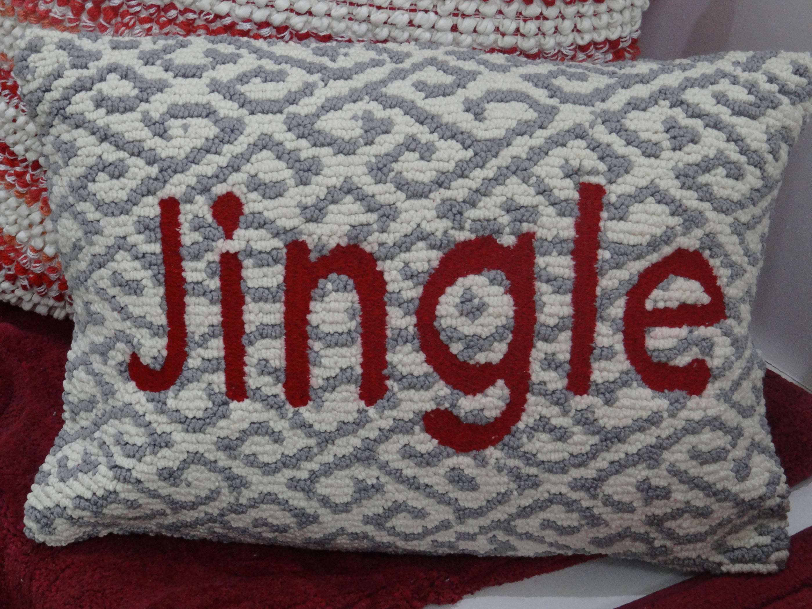 Chicos Home Jingle Decorative Cushion Cover in red and white with embroidered text, perfect for Christmas decor.