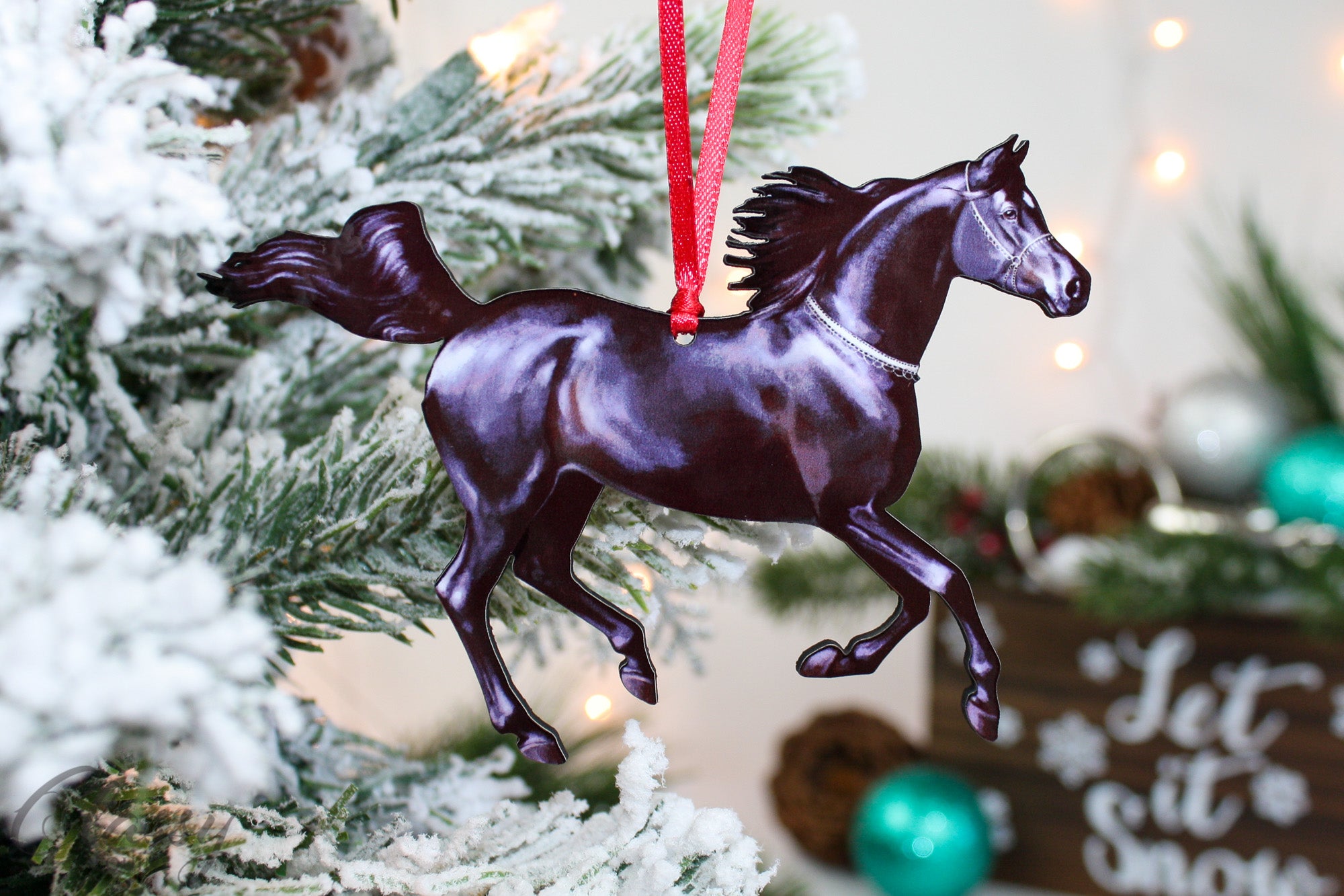 A beautifully crafted Black Arabian Horse ornament made of composite wood, featuring intricate laser-cut details, perfect for Christmas decoration.