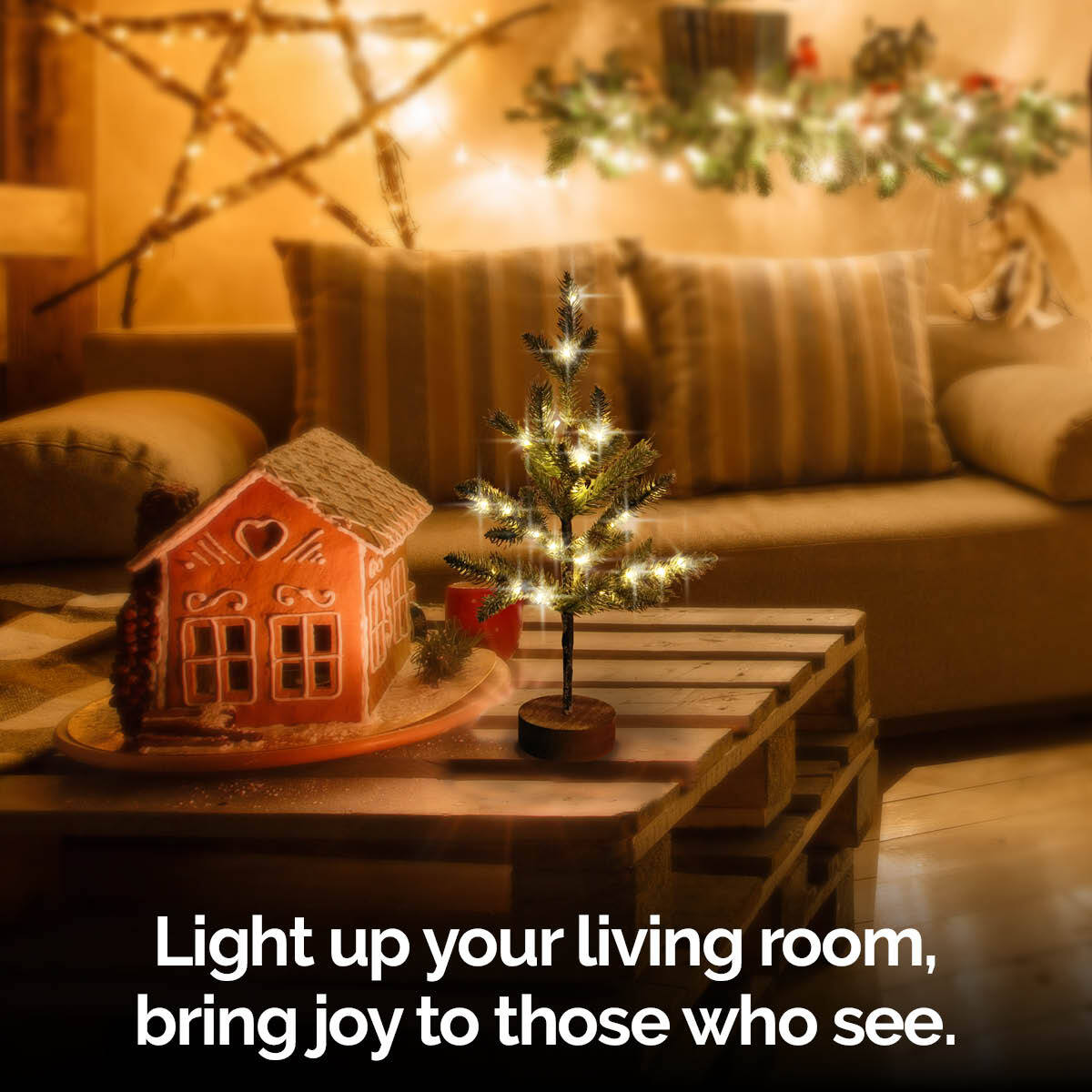 50cm Table Top Christmas Tree with warm white LED lights and sturdy wooden base, decorated with miniature ornaments.