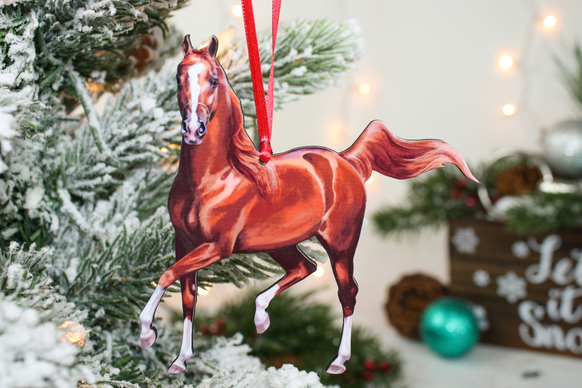 A beautifully crafted chestnut Arabian horse ornament made of composite wood, perfect for Christmas decoration.