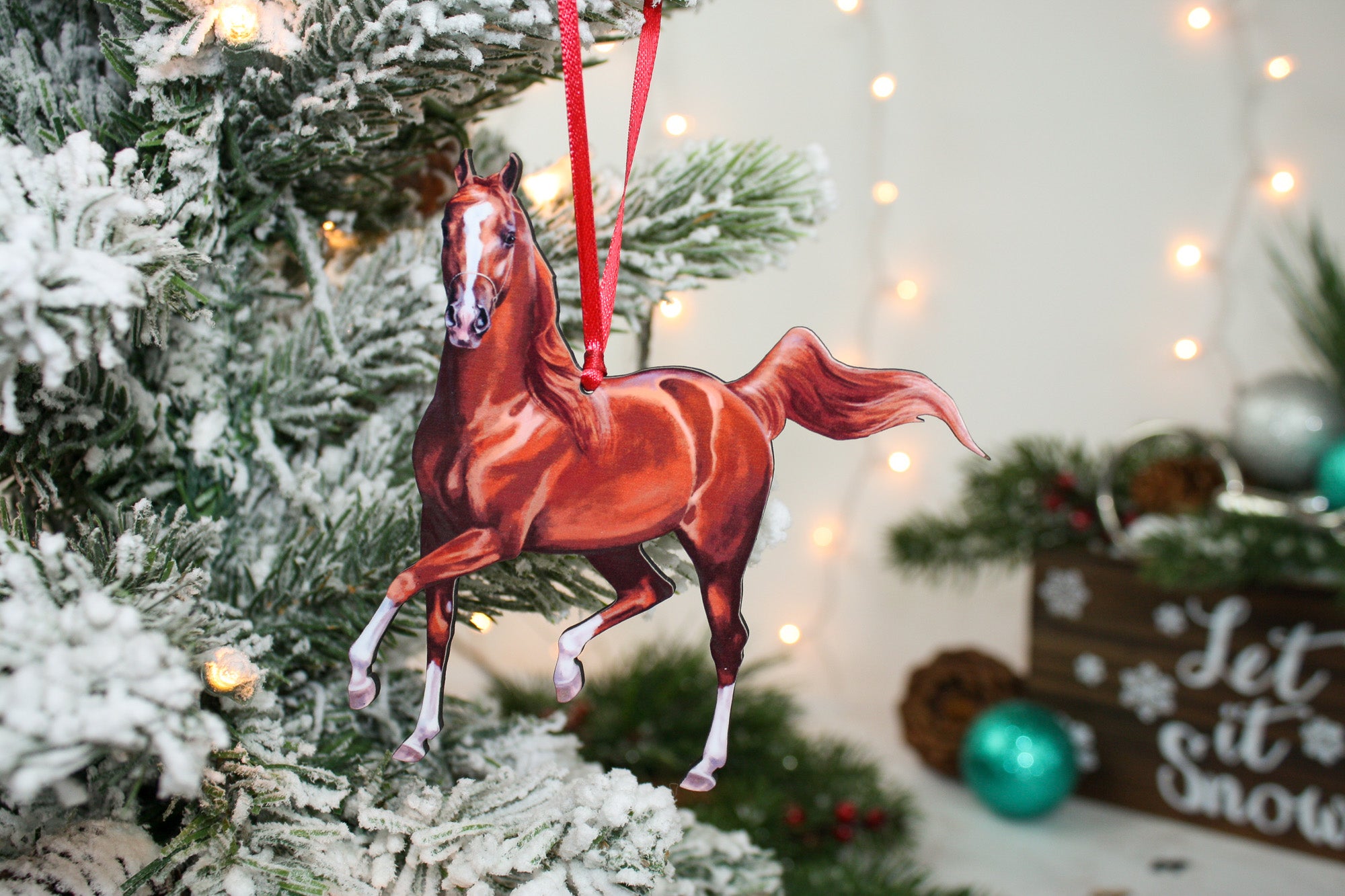 A beautifully crafted chestnut Arabian horse ornament made of composite wood, perfect for Christmas decoration.