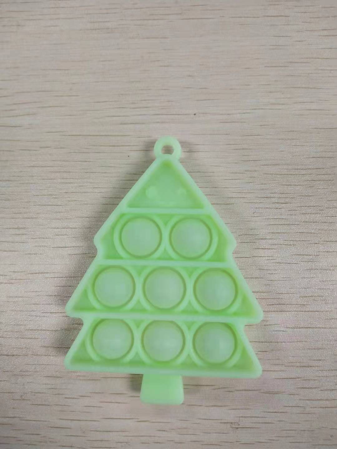 Colorful Christmas fidget toys featuring a snowman, deer, and festive hat, designed for kids aged 2-4 years.