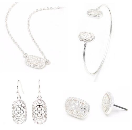 Kendra Style Small Oval Hollow Out Alloy Frame Earrings, featuring a delicate hollow out design perfect for Christmas gifting.