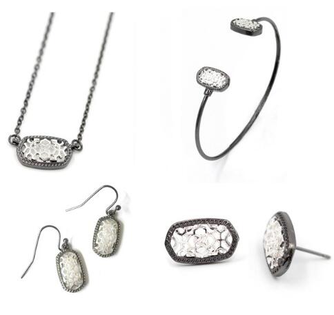 Kendra Style Small Oval Hollow Out Alloy Frame Earrings, featuring a delicate hollow out design perfect for Christmas gifting.