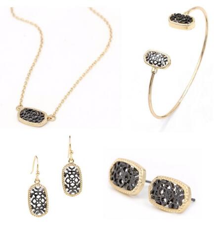 Kendra Style Small Oval Hollow Out Alloy Frame Earrings, featuring a delicate hollow out design perfect for Christmas gifting.