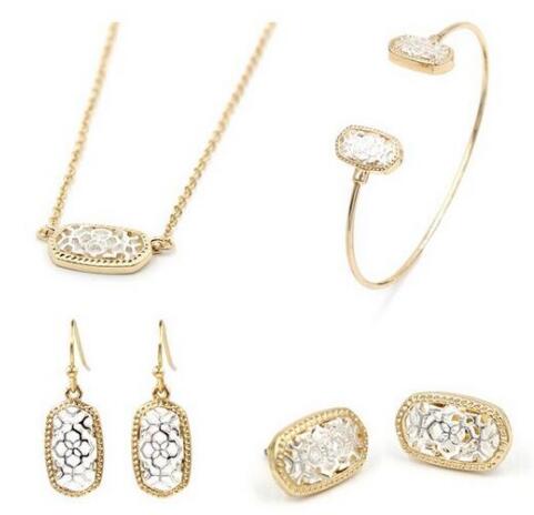 Kendra Style Small Oval Hollow Out Alloy Frame Earrings, featuring a delicate hollow out design perfect for Christmas gifting.