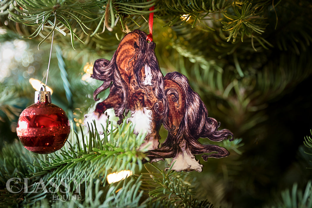 Colorful Gypsy Horse Christmas ornaments with various horse colors and ribbons, showcasing Jamie Mammano's design.