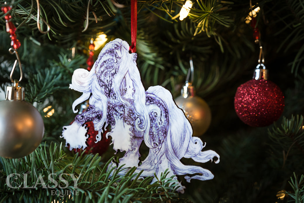 Colorful Gypsy Horse Christmas ornaments with various horse colors and ribbons, showcasing Jamie Mammano's design.