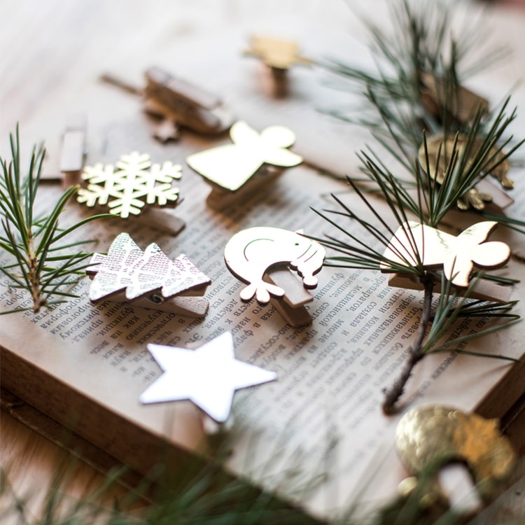 A set of 18 Christmas wood clips in various colors including gold and silver, perfect for holiday decorations and crafts.