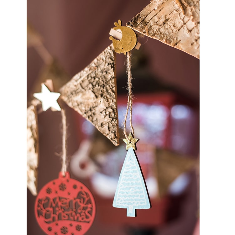 A set of 18 Christmas wood clips in various colors including gold and silver, perfect for holiday decorations and crafts.