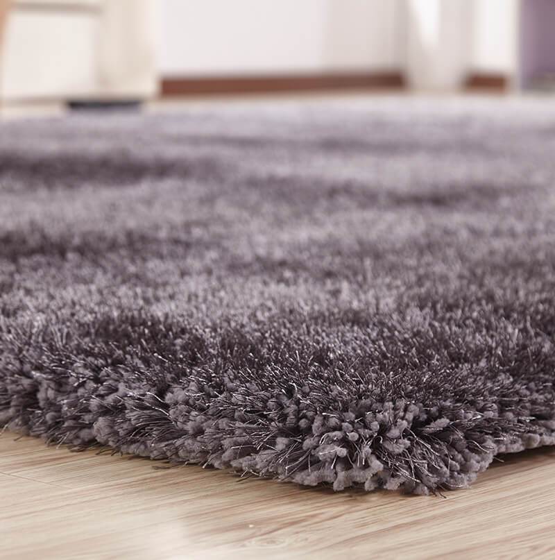 Chubby Gray Area Rug showcasing a soft shaggy texture in solid gray color, perfect for home decor.