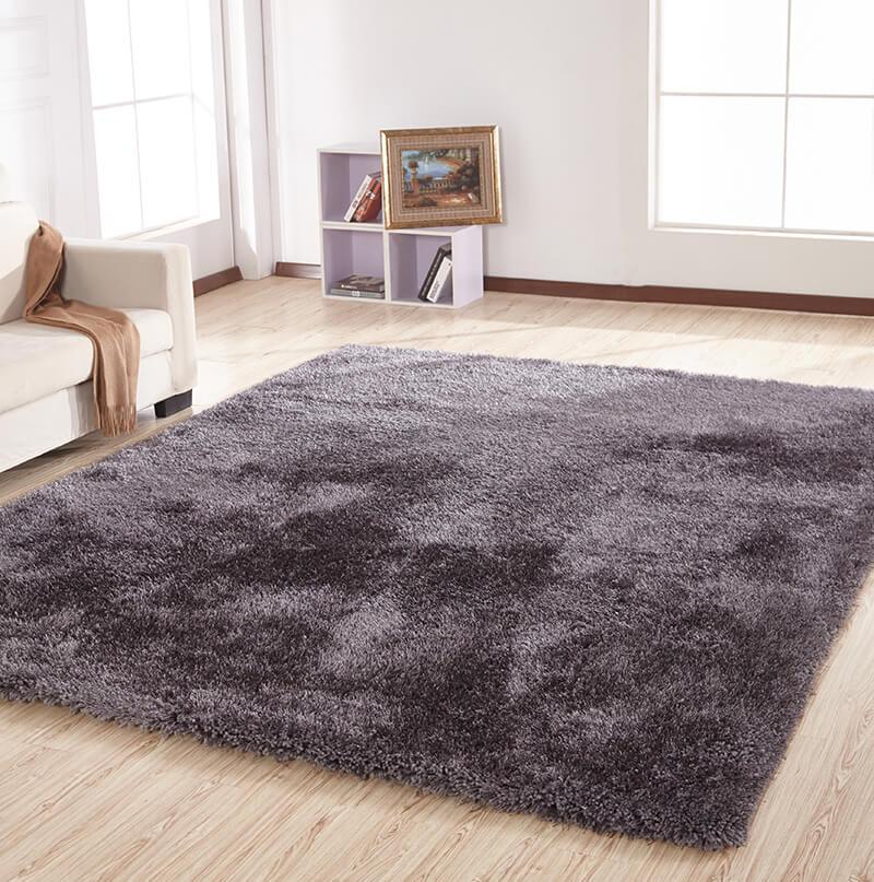 Chubby Gray Area Rug showcasing a soft shaggy texture in solid gray color, perfect for home decor.