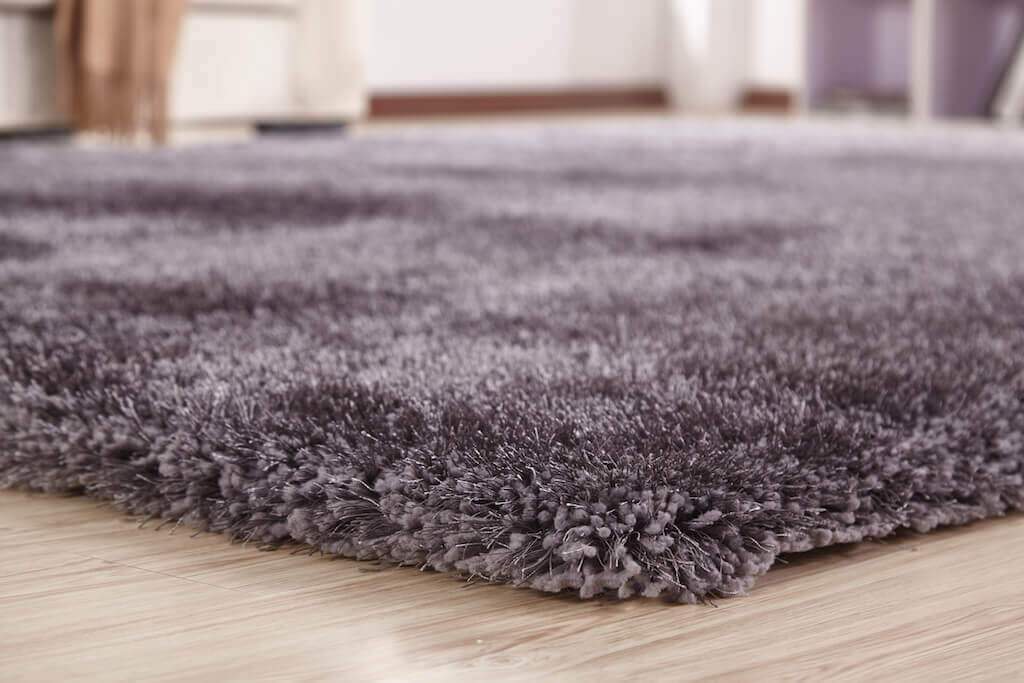 Chubby Gray Area Rug showcasing a soft shaggy texture in solid gray color, perfect for home decor.