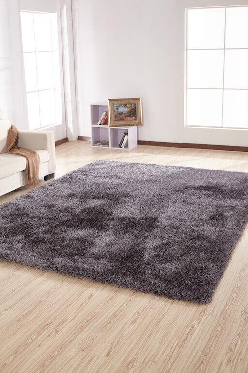 Chubby Gray Area Rug showcasing a soft shaggy texture in solid gray color, perfect for home decor.