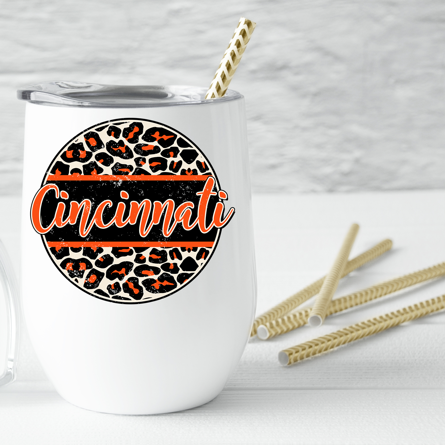 Cincinnati Distressed Leopard Circle Wine Tumbler with a stylish leopard print design, perfect for on-the-go drinks.