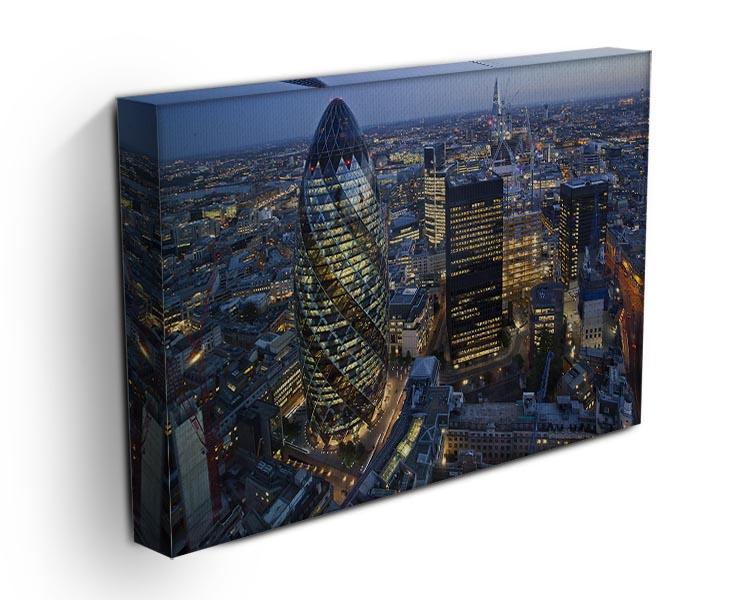 Canvas print or poster of the City of London illuminated at night, showcasing the skyline and vibrant city lights.