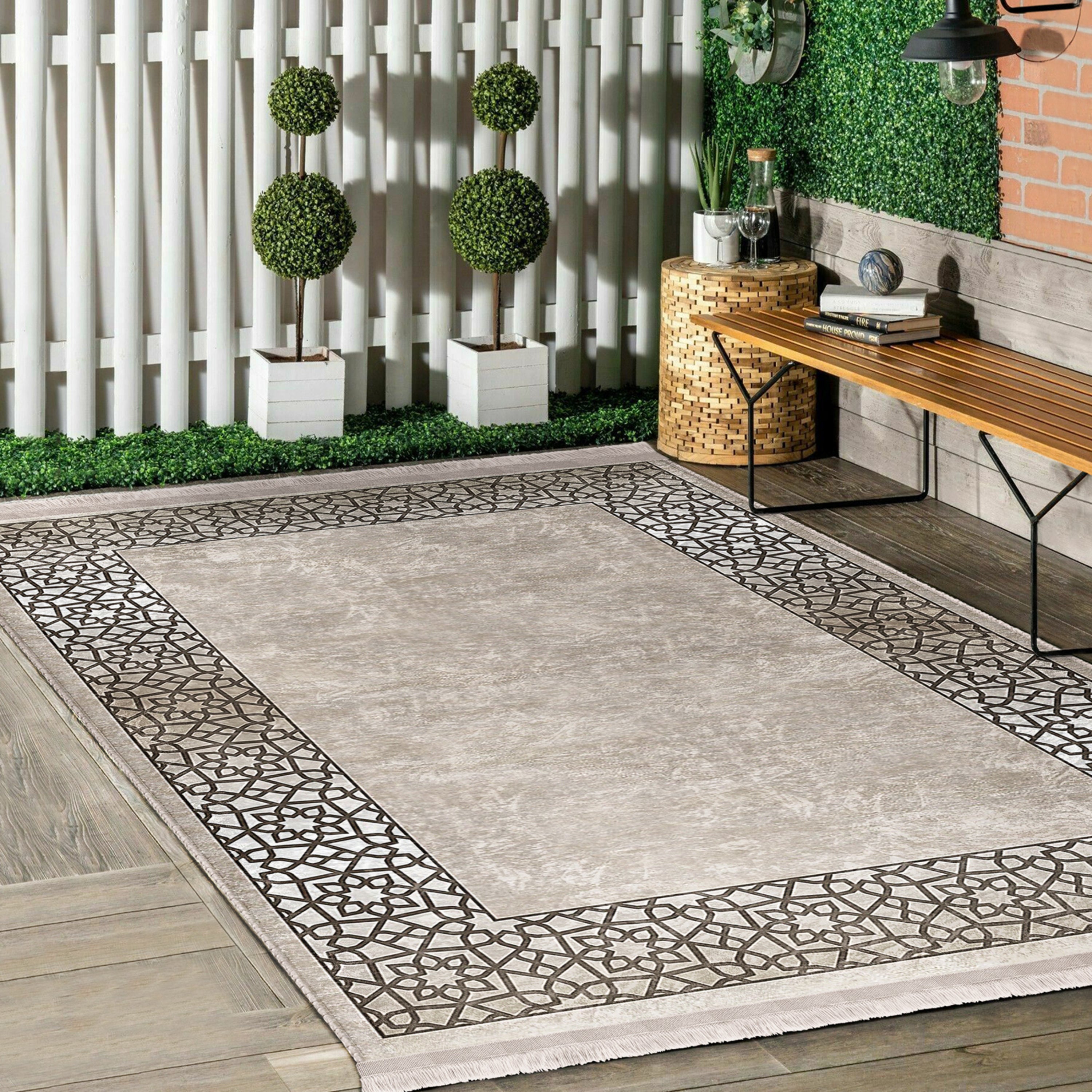 Classic Motifs Washable Area Rug featuring intricate design and fringes, perfect for enhancing home decor.