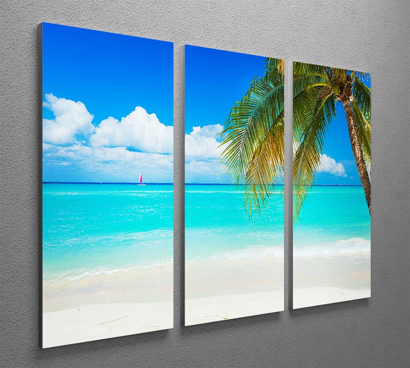 A beautiful 3-panel canvas print depicting a serene clear blue sea beach, perfect for home decor.