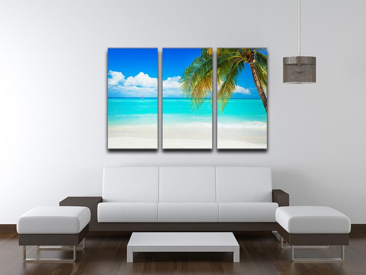 A beautiful 3-panel canvas print depicting a serene clear blue sea beach, perfect for home decor.