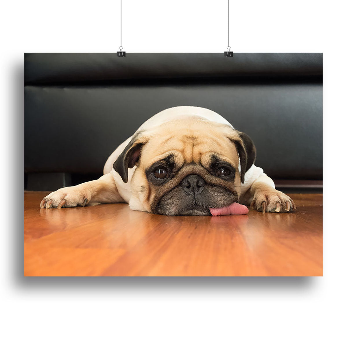 Close-up face of a cute pug on a canvas print, showcasing its expressive eyes and wrinkled face.