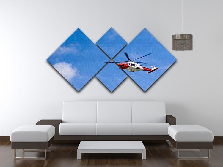 A vibrant multi-panel canvas artwork featuring a Coastguard helicopter flying in a clear blue sky, divided into four equal sections.
