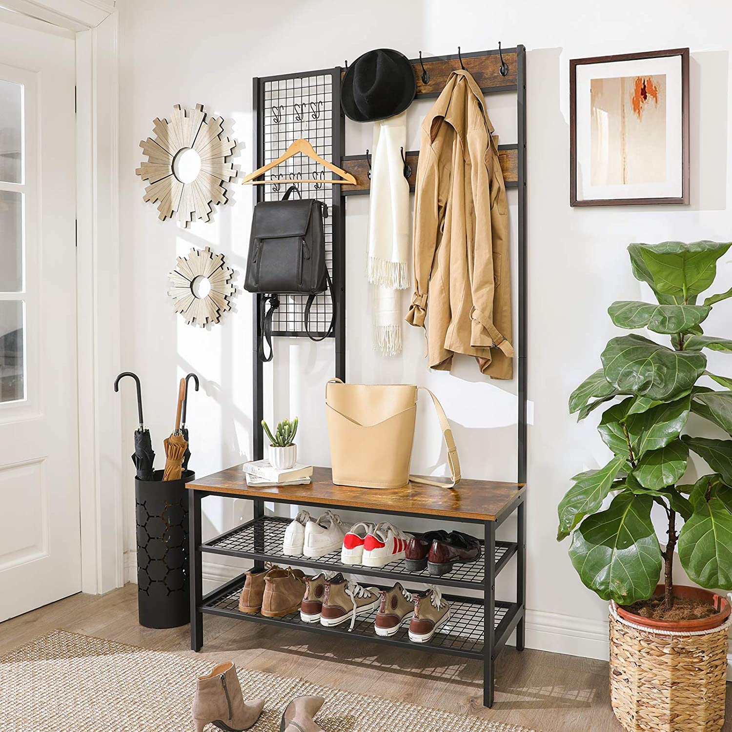 Industrial style coat rack stand with grid wall and shoe storage, featuring multiple hooks and shelves for organization.