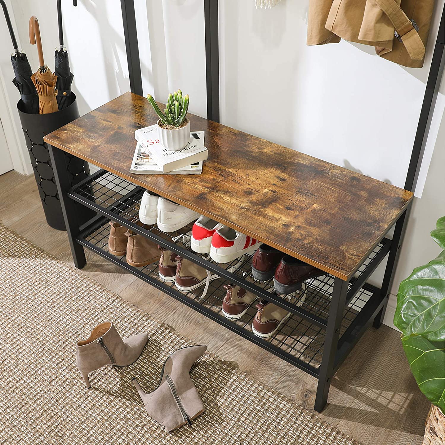 Industrial style coat rack stand with grid wall and shoe storage, featuring multiple hooks and shelves for organization.