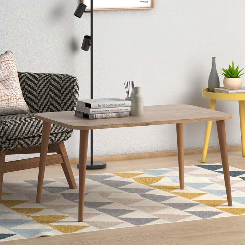 Coffee Table LUISE Oak with melamine surface and solid beech wood legs, showcasing its elegant design and oak finish.