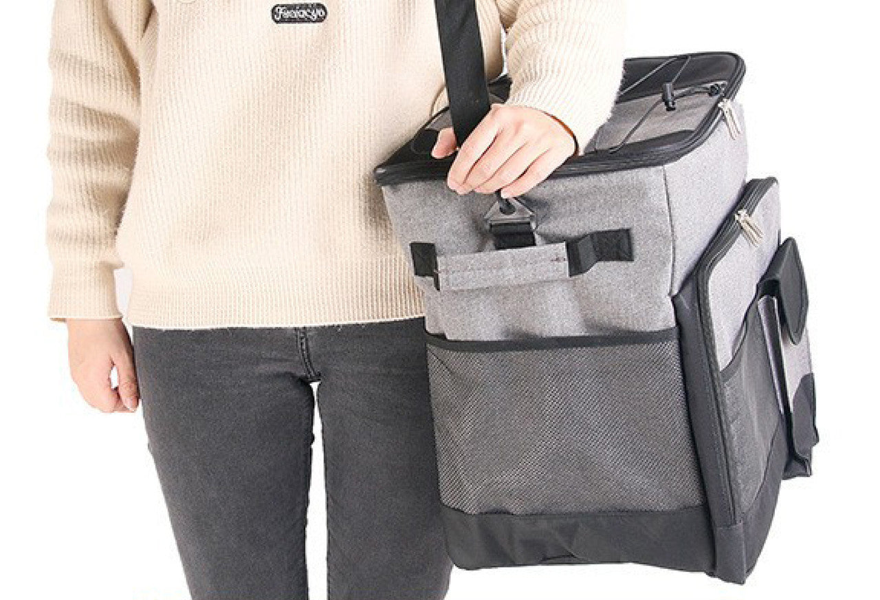 Grey Cooler Picnic Bag Trolley with wheels, designed for outdoor events, holding up to 60 cans.