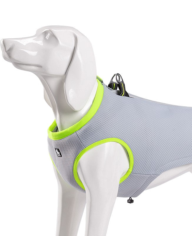A vibrant neon yellow cooling vest for dogs, designed for comfort and cooling, featuring zippers and D rings for leash attachment.