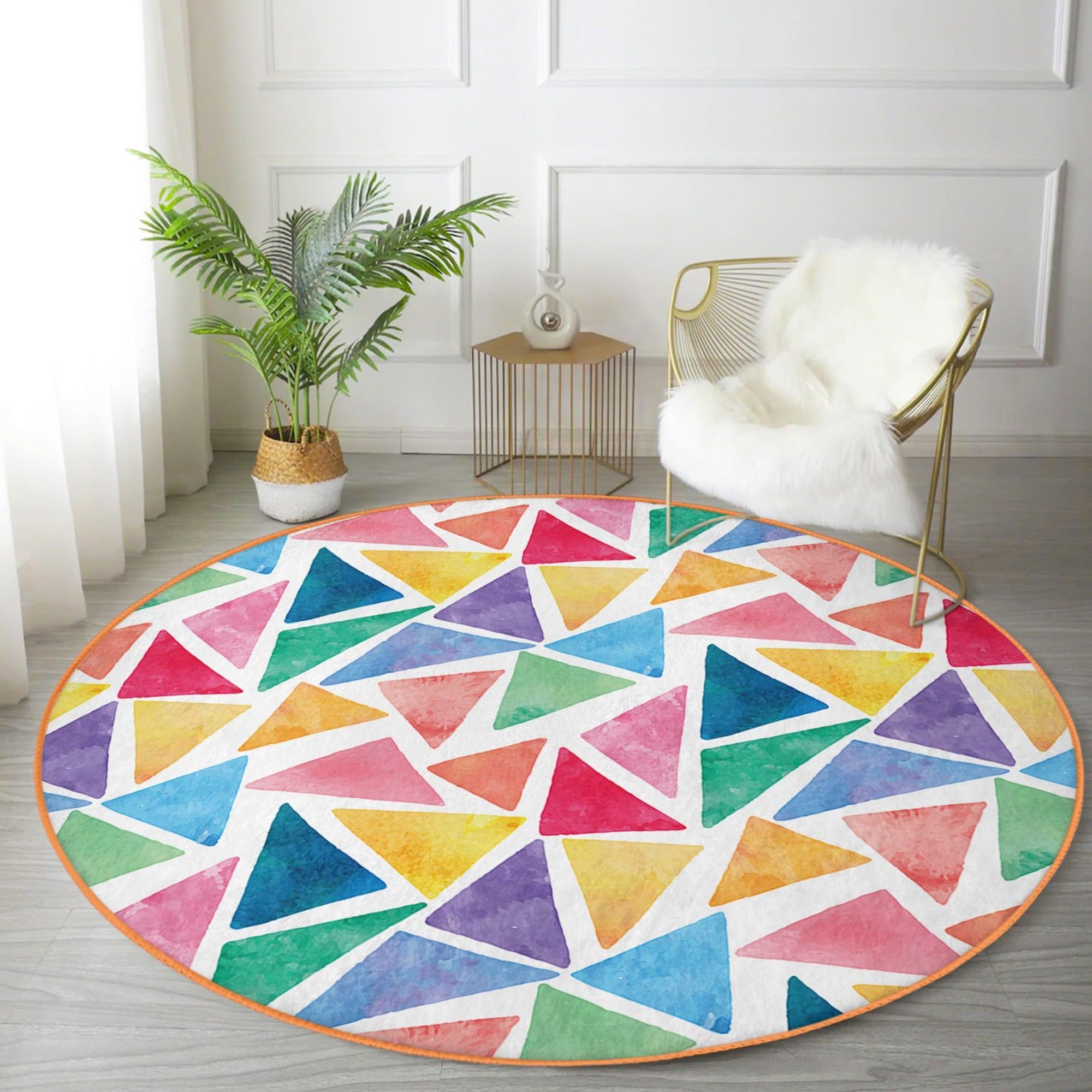 Colorful round rug featuring a vibrant triangle pattern, designed for kids' playrooms, made from soft velvet fabric.