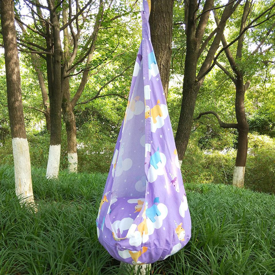 Colorful unicorn hammock swing chair designed for children, featuring a vibrant multi-color pattern and made from durable cotton and plastic materials.
