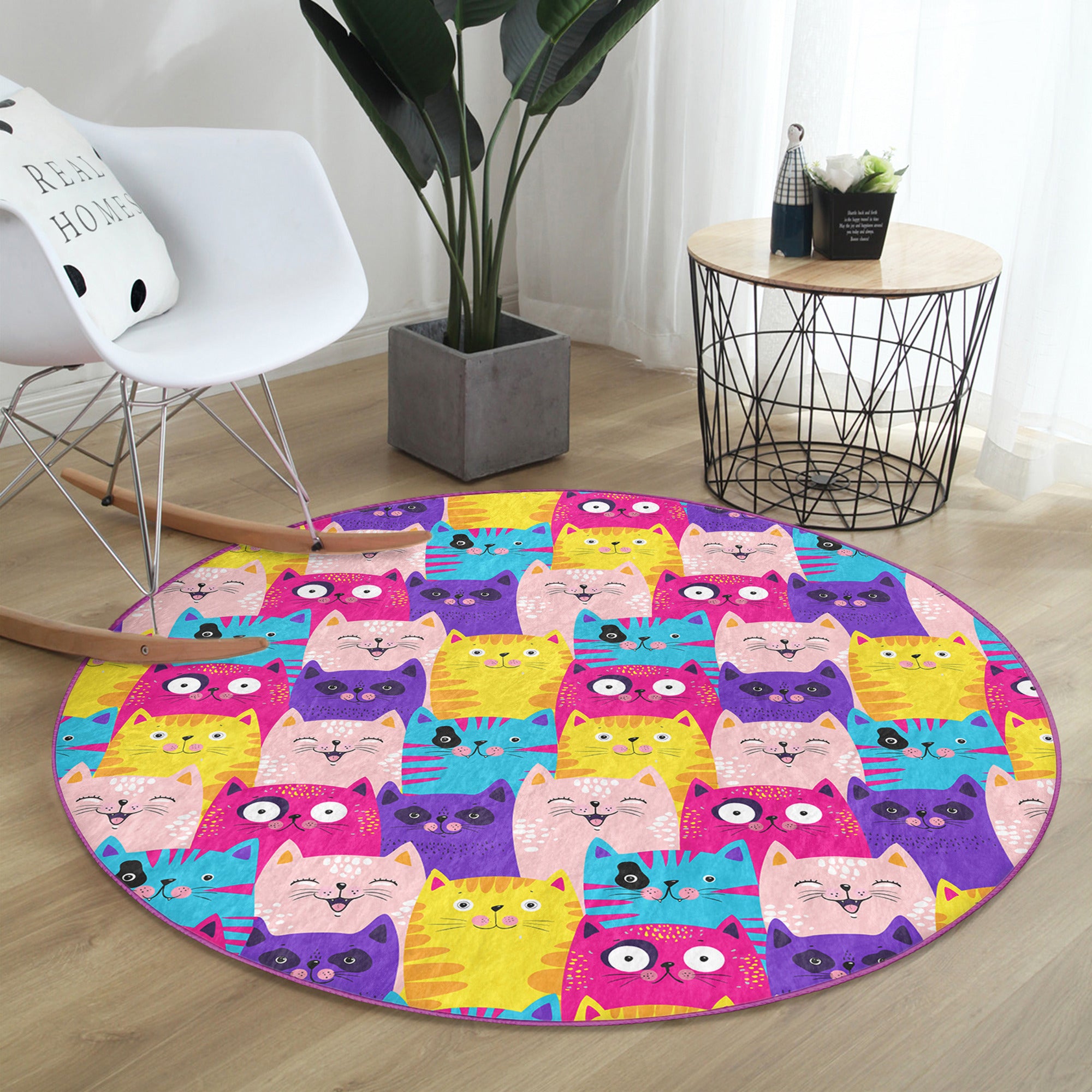 A vibrant round rug featuring a playful pattern of colorful cats, perfect for cat lovers and home decor.