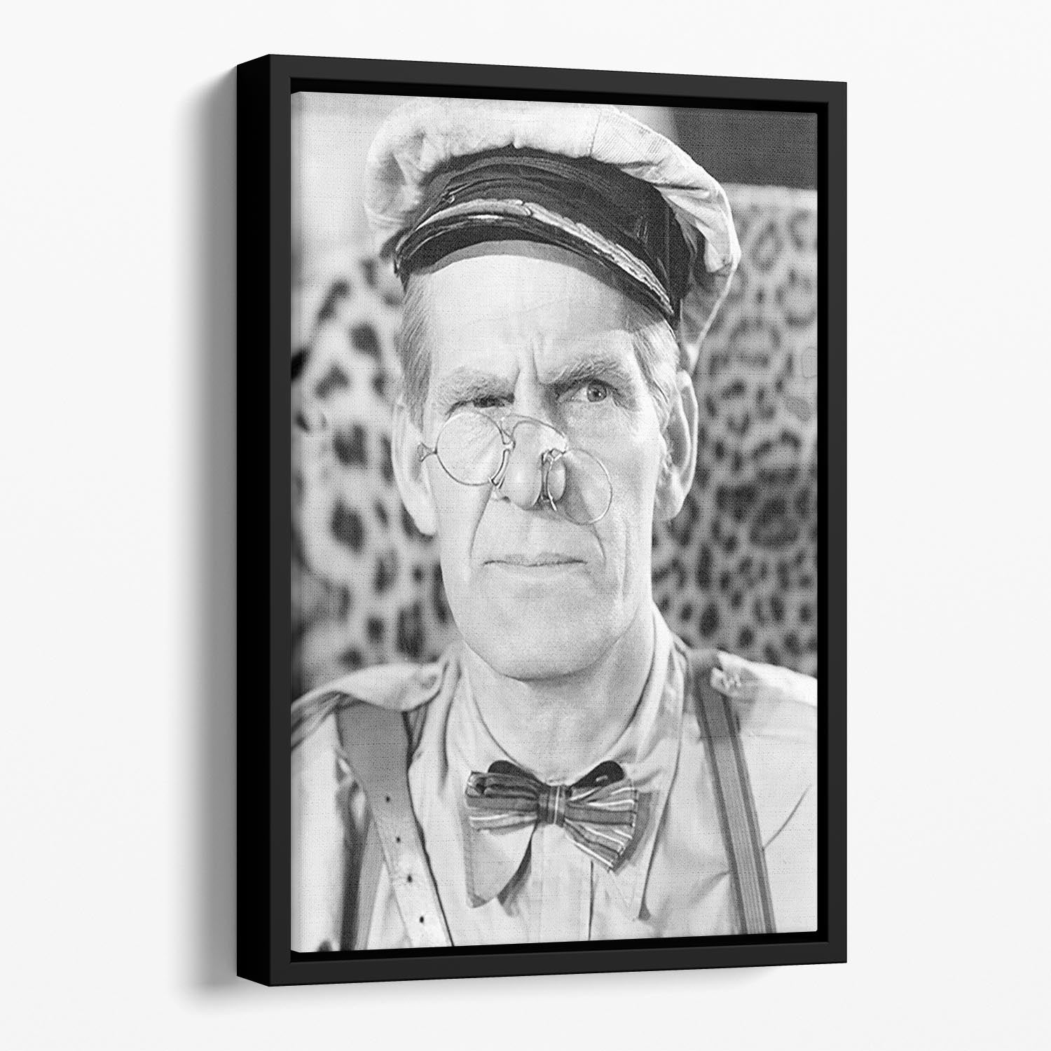 Comedian Will Hay Floating Framed Canvas featuring vibrant abstract art in an elegant wooden frame.