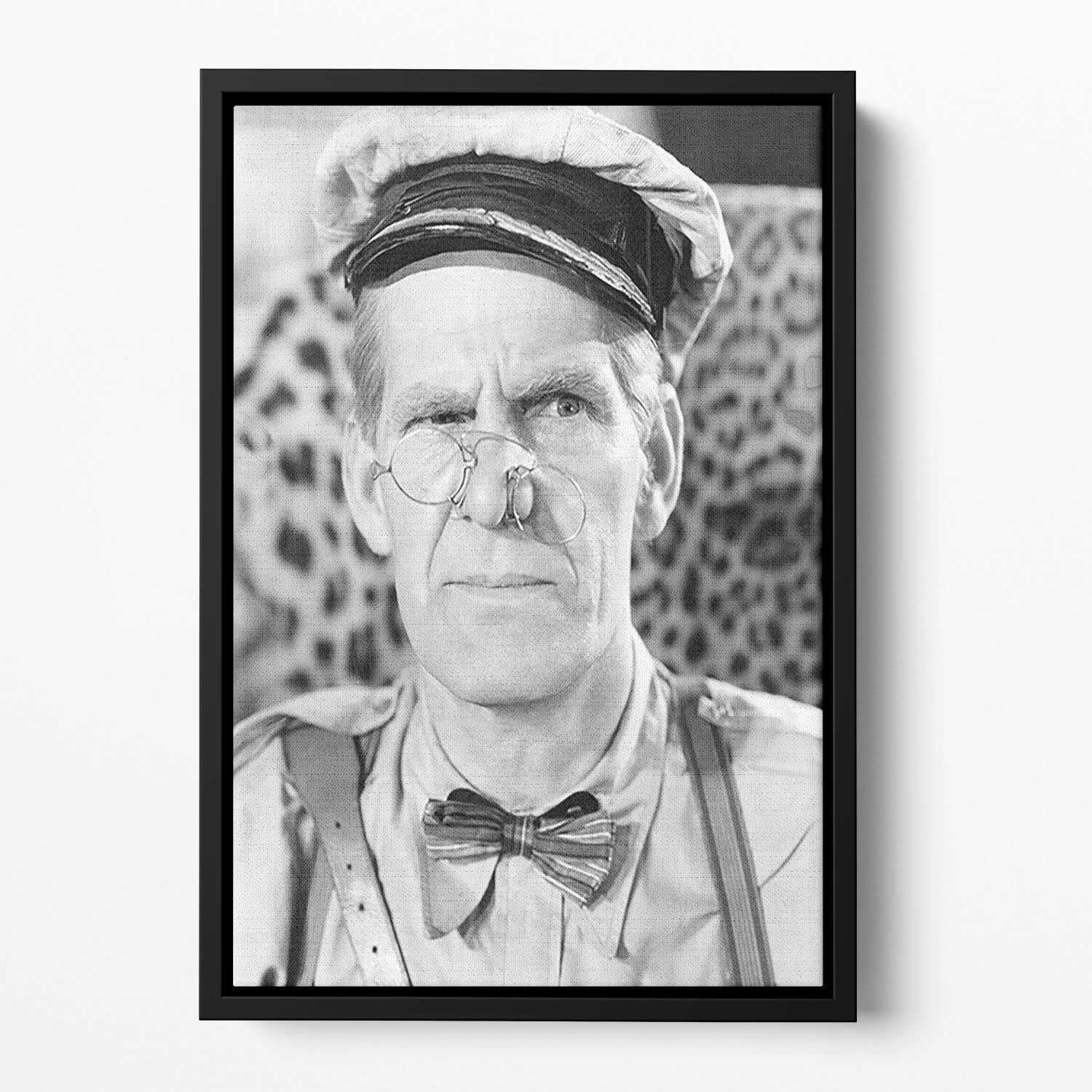 Comedian Will Hay Floating Framed Canvas featuring vibrant abstract art in an elegant wooden frame.