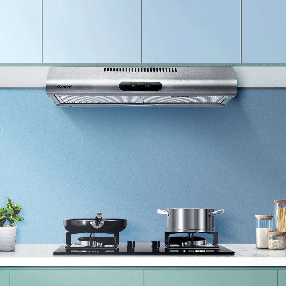 Comfee 600mm stainless steel range hood installed in a modern kitchen, showcasing its sleek design and LED lighting.