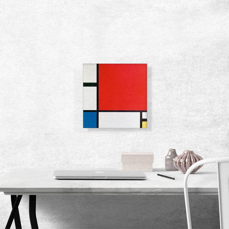 A vibrant abstract canvas art piece featuring bold red, blue, and yellow colors in geometric shapes, perfect for modern decor.
