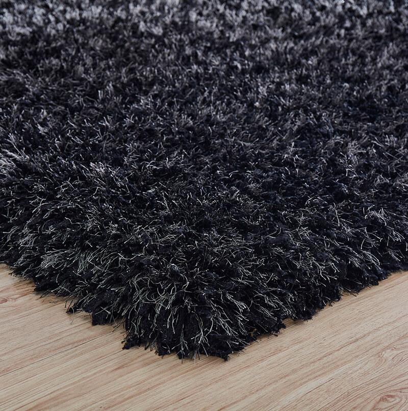 Coral Graphite Shag Area Rug showcasing a luxurious high-pile texture in a rich graphite black color, perfect for enhancing home decor.