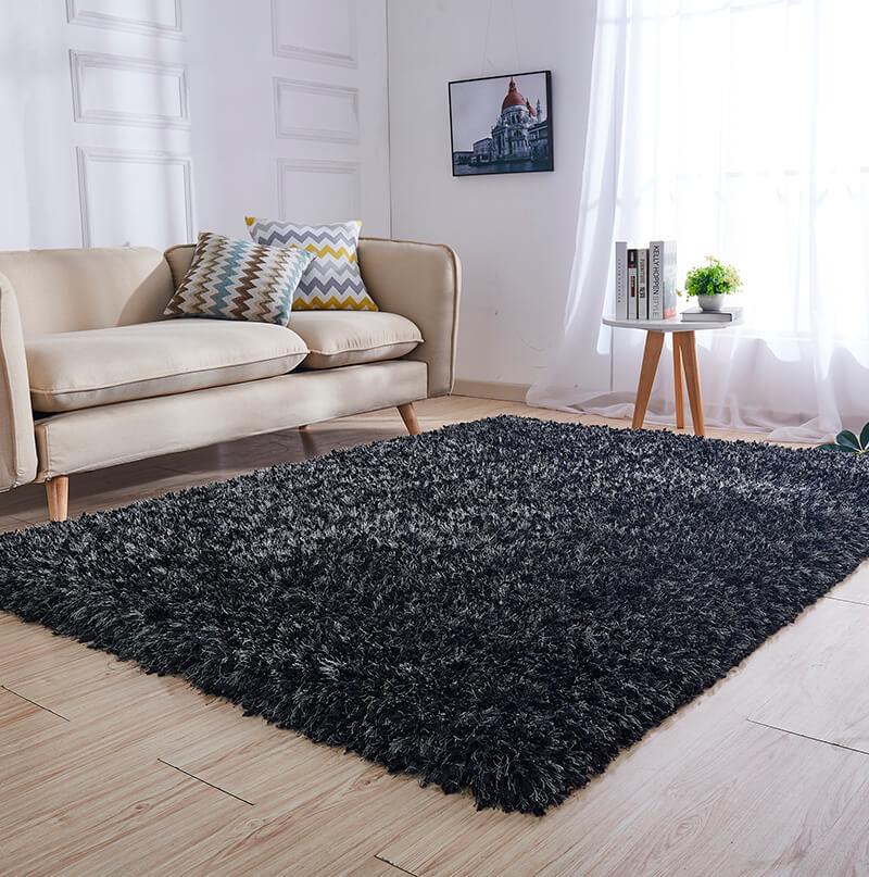 Coral Graphite Shag Area Rug showcasing a luxurious high-pile texture in a rich graphite black color, perfect for enhancing home decor.
